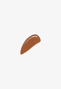 Échantillon lisse et courbé de couleur brun moyen avec une surface brillante, ressemblant à un produit de maquillage, présenté sur un fond blanc.