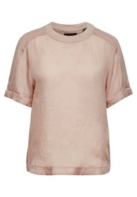 Camicetta rosa chiaro a maniche corte in tessuto morbido con scollatura rotonda e maniche arrotolate. Presenta una vestibilità morbida e ventagli laterali all'orlo.