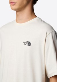 The North Face VINTAGE ARCHIVE - Triko s potiskem - white dune tnf black