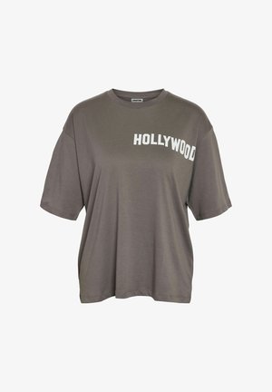 Gray oversized t-shirt with a round neck and short sleeves. Features the word "HOLLYWOOD" in bold white letters across the front.