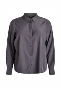 Tumši pelēks ilgām piedurknēm izgatavots pogājamais krekls ar norādītu apkakli un metāla snap pogām gar priekšpusi, attēlots uz baltā fona.