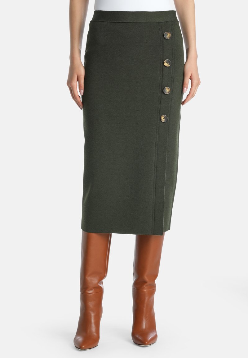 Knit pencil skirt in dark green with a high waist, side button closure featuring four gold-tone buttons, paired with brown knee-high boots.