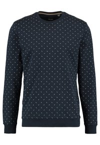 Sweatshirt blu navy in morbido tessuto con collo a giro. Il design presenta piccoli motivi bianchi ripetitivi e polsini e orlo a costine.