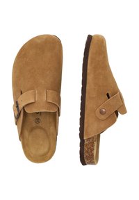 Brown suede clogs with a strap and buckle detail, cork footbed, and textured rubber sole. Open back design for easy wear.