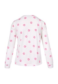 White long-sleeve shirt featuring a repeating pattern of pink lips. Soft texture, rounded neckline, and fitted sleeves.