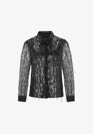 Camicia nera con bottoni e maniche lunghe, decorata con paillettes argento verticali e dettagli di frange. Collo e polsini sono in tessuto nero uniforme.