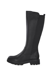 Botas negras hasta la rodilla, hechas de cuero suave, con paneles laterales elásticos, una suela de goma gruesa y un mínimo de detalles metálicos.
