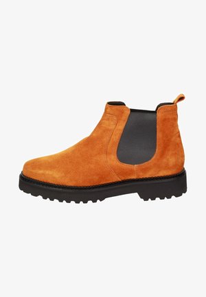 Suede ankle boot in orange with black elastic side panels, textured finish, round toe, and rugged rubber sole with tread patterns.