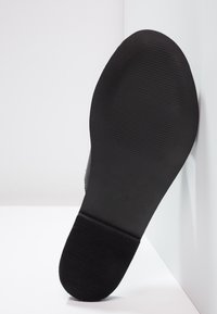 KIOMI Platt slip-in - black