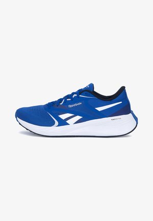 Scarpa da corsa Reebok blu con accenti bianchi, fodera interna nera e suola spessa bianca con la scritta "Floatride Fuel" su sfondo bianco.