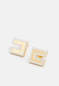 Gold earrings with a square shape featuring a white accent and geometric design. Smooth texture with polished finish and secure backing.