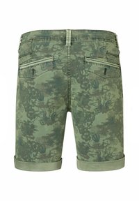 Camouflage-patterned green shorts made of cotton with a rolled hem and two back pockets, featuring a textured fabric design.