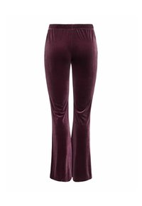 Bukser med vidde i dyb bordeaux fløjl. Har elastisk talje og en glat tekstur, designet til let at indsnævre mod buksekanten.