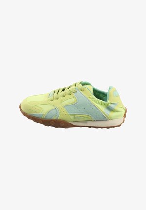 Green and yellow athletic shoe featuring suede and mesh materials, lace-up design, and a rubber sole with a textured pattern.