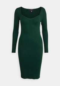 Grön, räfflad långärmad klänning med fyrkantig halsringning, figursydd silhuett och textil med struktur; knälång design.