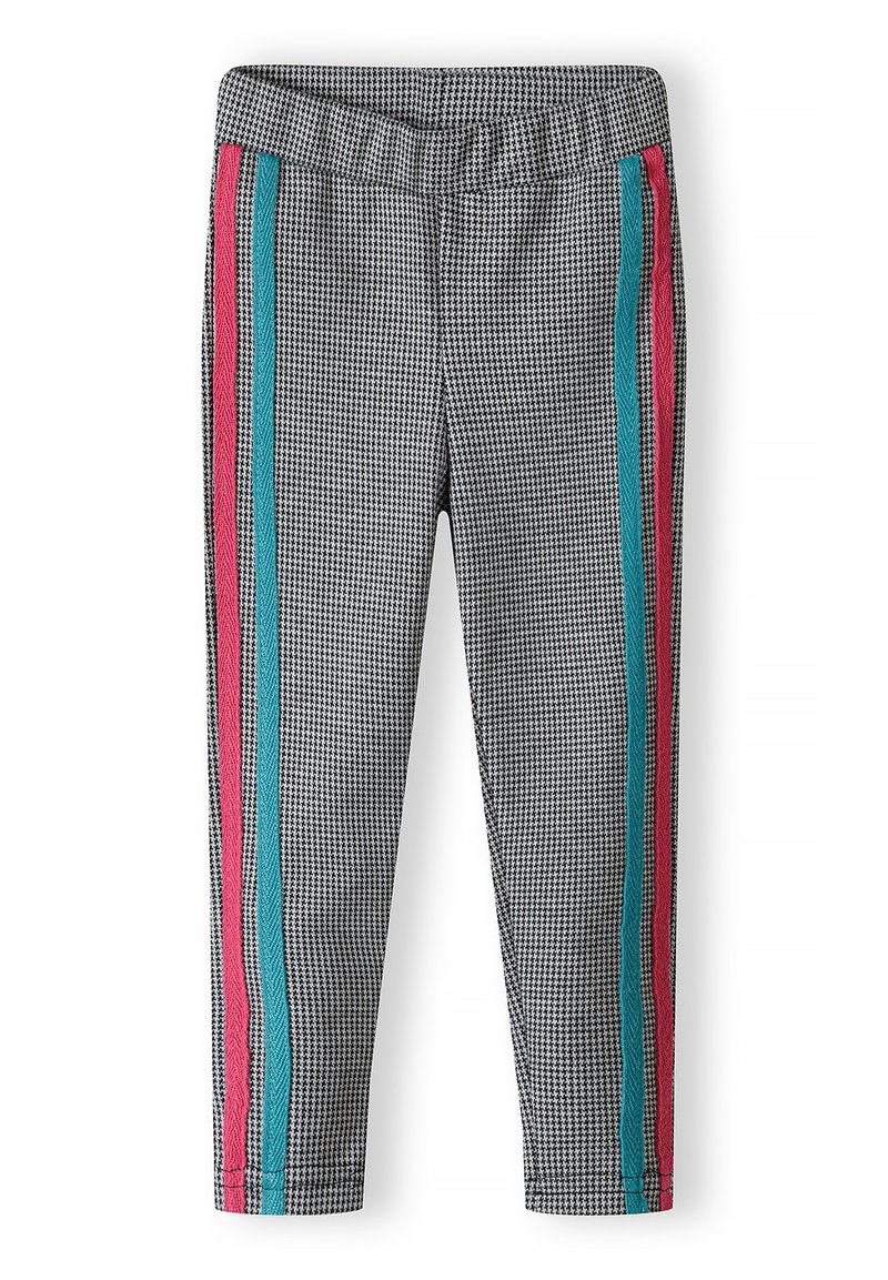 Leggings hasta el tobillo en blanco y negro con estampado de houndstooth, cinturilla elástica y franjas laterales en contraste en rosa y azul.