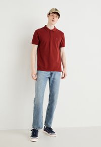 Levi's® Polo marškinėliai - fired brick