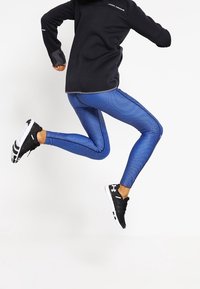 Under Armour Vindjacka - black