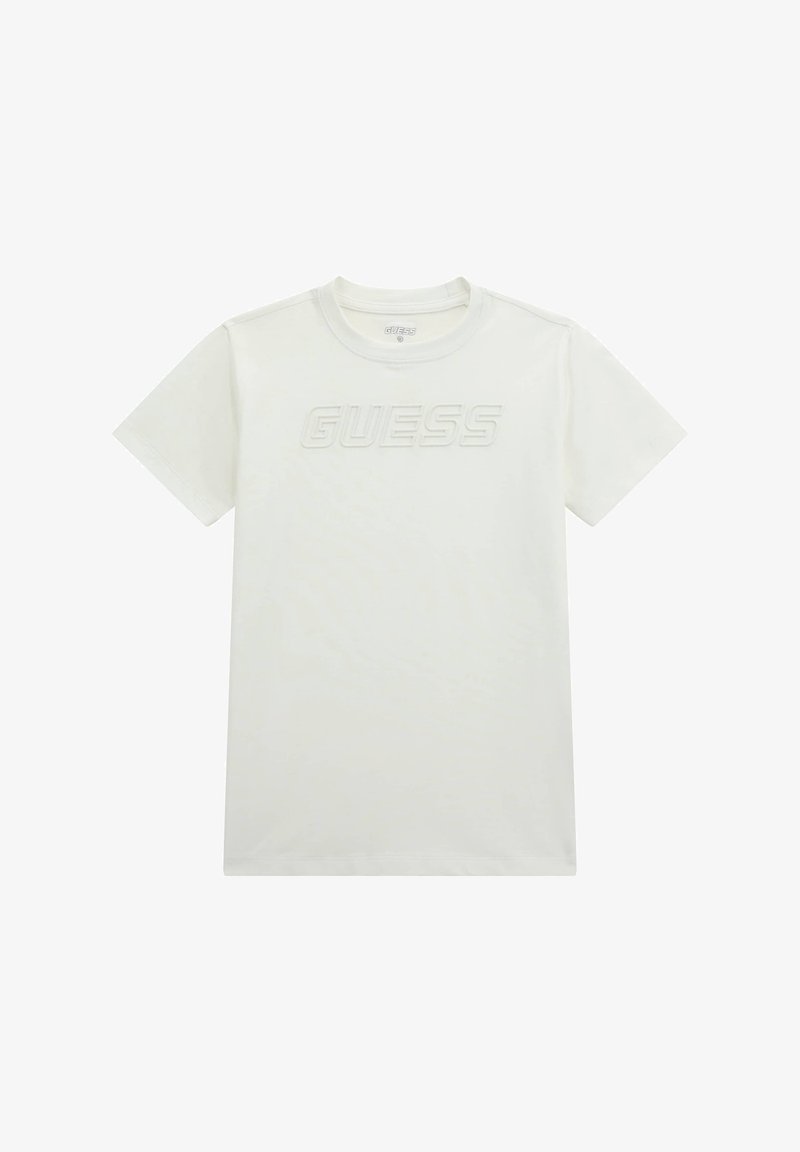 White cotton t-shirt featuring short sleeves and a crew neckline. The word "GUESS" is embossed across the chest in a slightly darker shade.