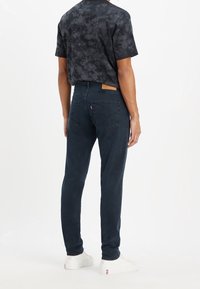 Levi's® Jeans Tapered Fit - dark-blue denim