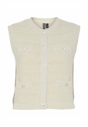 Chaleco de punto beige con cuello redondo, mangas cortas, cinco botones decorativos de cristal y dos bolsillos delanteros. Diseño de tela texturizada.