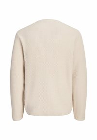 Pull en maille couleur crème à manches longues vu de dos avec un motif nid d'abeille texturé et un col rond.