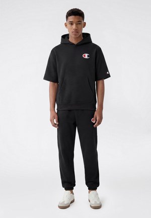 Champion, CHAMPION ELASTIC CUFF PANTS BLACK CHAMPION - Pantalones deportivos - black