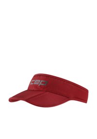 Red visor made of textured fabric, featuring a wide brim and a silver logo on the front band. Lightweight and adjustable design.