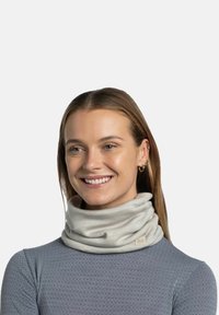 Light gray neck gaiter made from soft fabric, featuring a smooth texture and a small brand logo on a folded edge.