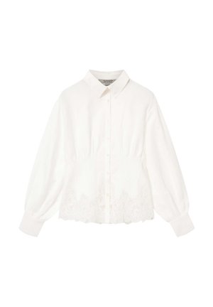 Chemise blanche à boutons avec col classique, texture plissée à la taille et détails en dentelle intricats à l'ourlet. Manches longues avec poignets.