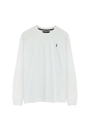 Wit shirt met lange mouwen en ronde hals, met een klein zwart polo-spelerlogo op de linkerborst, met het label "Polo Club" aan de binnenkant van de kraag.