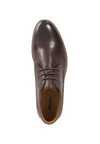 Brown leather dress shoe with a smooth finish, rounded toe, and eyelet lacing. Interior features a tan lining. Rubber sole with light stitching.