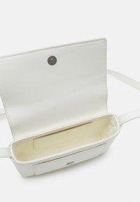 Calvin Klein MUST MINI BAG MONO - Umhängetasche - marshmallow