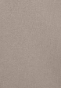 Lichtbeige stof met een fijne, geribbelde textuur; gladde oppervlakte en consistente kleur overal. Geen zichtbare patronen of accenten.