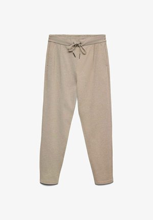 Pantaloni felpa beige con una vita regolabile con cordoncino, due tasche laterali e gambe affusolate. Il tessuto ha un aspetto morbido e strutturato.