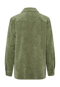 Giacca di cammello in velluto a coste verde con colletto, maniche lunghe, texture a coste e polsini con bottone. La vista posteriore mostra un taglio dritto e dettagli di cucitura.