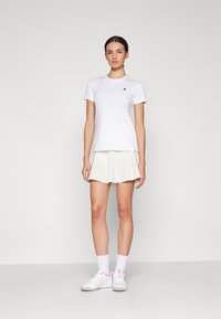 Björn Borg ACE SKIRT POCKET - Αθλητική φούστα - egret