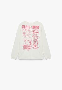 Camiseta blanca de manga larga con diseños gráficos en rosa, que incluyen texto e ilustraciones en la parte de atrás. Tejido suave, corte holgado, cuello redondo.
