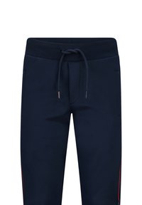 Marineblaue Sweatpants mit Kordelzugbund, ausgestattet mit zwei seitlichen Taschen und kontrastierenden roten Streifen an den Seitenähten. Glatte Textur.