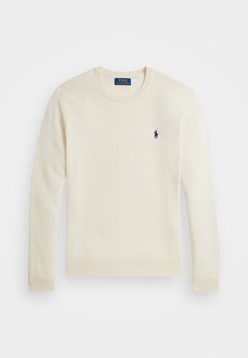 Pull crème à manches longues col rond, avec poignets et ourlet côtelés, présentant un petit logo Polo Ralph Lauren bleu marine sur la poitrine.