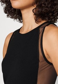 WAL G. HOLIDAY BILLY PANEL MINI - Φόρεμα από ζέρσεϊ - black