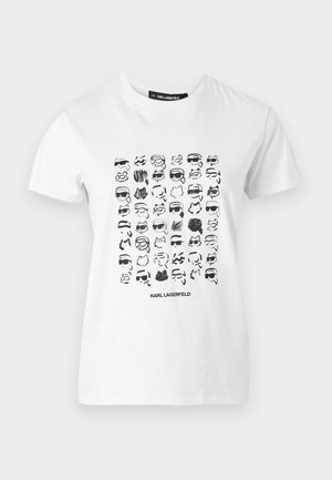 Valge puuvillane t-särk, millel on mustade graafiliste nägude ja aksessuaaride ruudustik. Prinditud on erinevaid stiile, all on "KARL LAGERFELD".