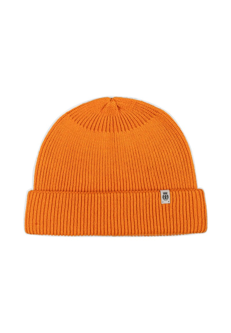 Orange knitted beanie featuring a ribbed texture and a folded cuff. A small tag is visible on the side of the cuff.
