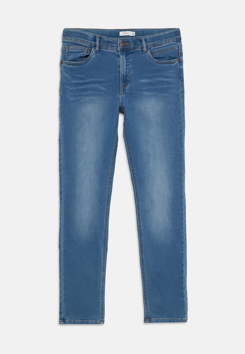 Jeans skinny azuis feitos de denim com áreas desbotadas, cinco bolsos e fecho por botão. Design de perna reta com detalhes em costura.