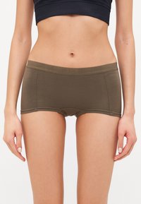 Olivegrønne bomullsblandingshipstershorts med en glatt tekstur, tettsittende design, flate sømmer og en myk midje.