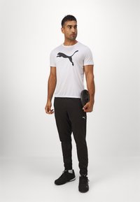 Puma TAD ESSENTIALS SOLID CAT TEE  - Αθλητικό μπλουζάκι - white