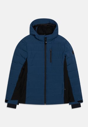 Padded jacket w ciemnoniebieskim kolorze z zapięciem na zamek, kapturem, czarnymi panelami po bokach i elastycznymi mankietami. Posiada kieszeń zipową na klatce piersiowej.