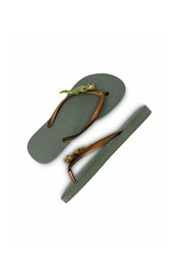 Green flip-flops with textured rubber soles, featuring a brown thong strap adorned with a decorative green lizard.