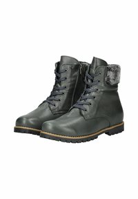 Bottines en cuir vert avec un revers en fourrure, bout rond et fermeture à lacets. Comprend une fermeture éclair sur le côté et une semelle en caoutchouc texturé.