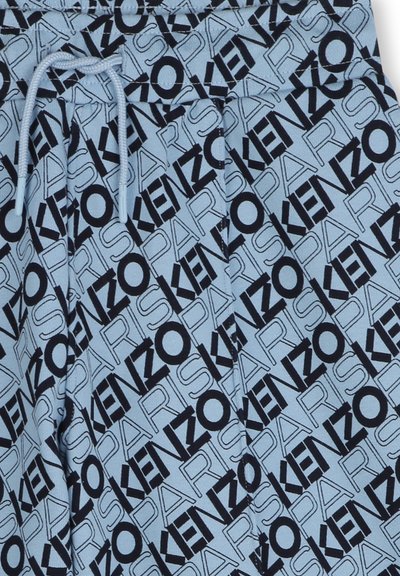 Lichtblauwe katoen sweatpants met zwart "KENZO PARIS" logo patroon, voorzien van een elastische tailleband en trekkoord voor aanpassing.
